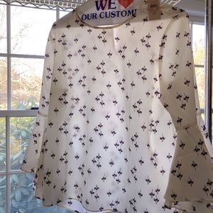 White blouse with cranberry design